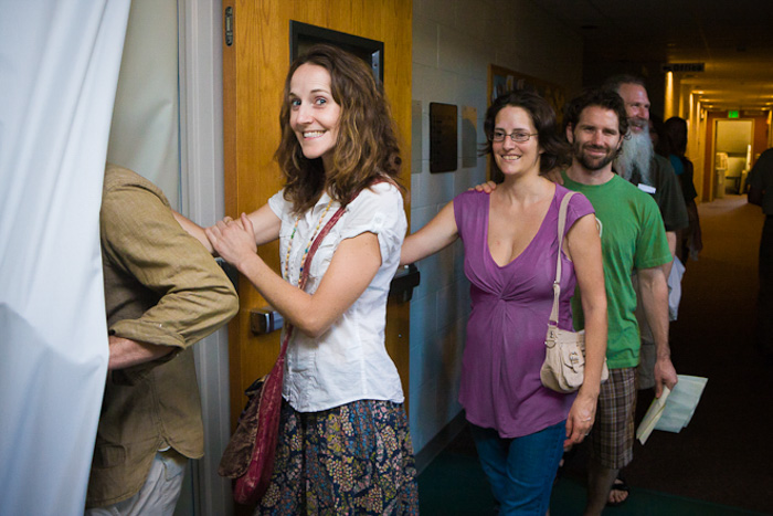 Customers Walking Into an Eat in the Dark Restaurant